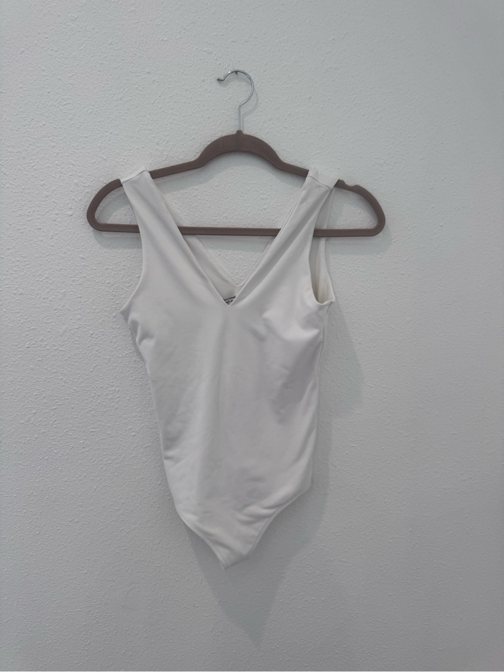 Abercrombie and Fitch White V‑Neck Bodysuit